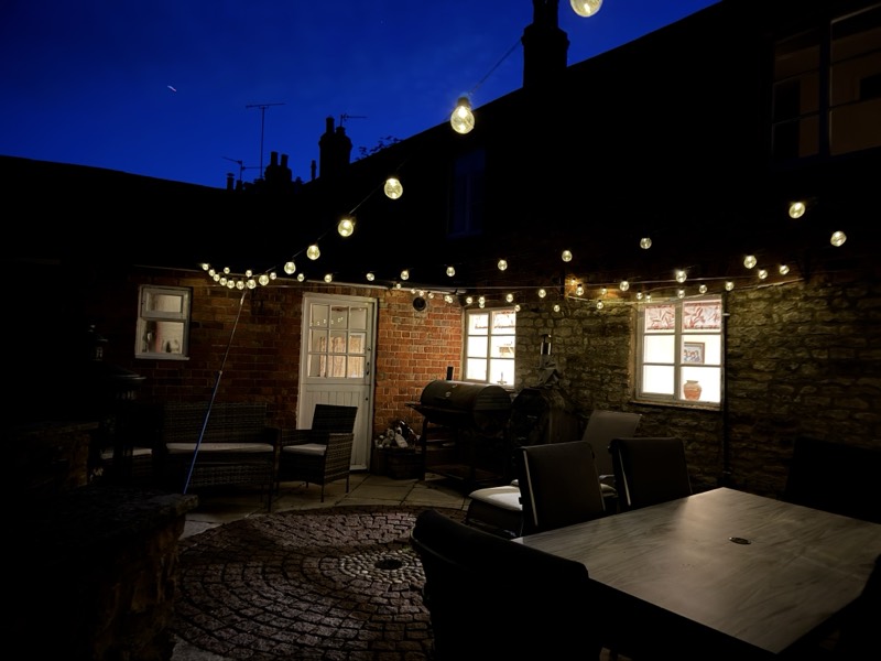 Patio at dusk with string lights
